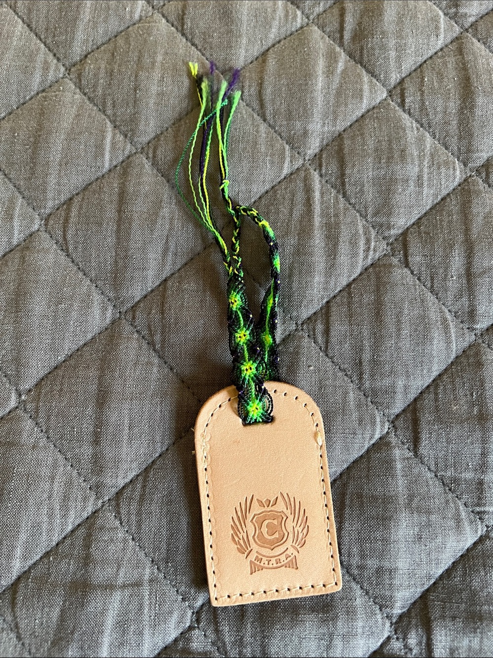 CONSUELA Natural Leather bag tag charm.